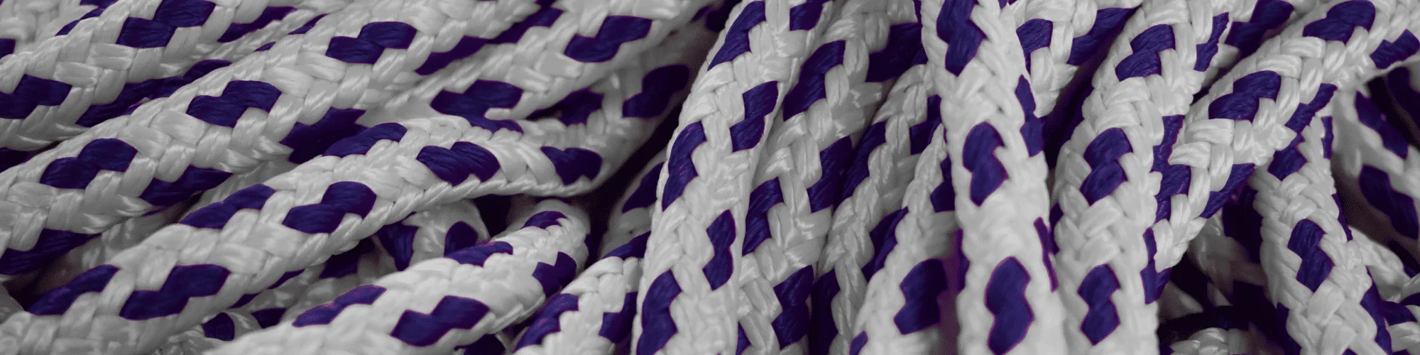 White and purple braided MFPP line: buoyant multifilament polypropylene cordage for marine and industrial utility
