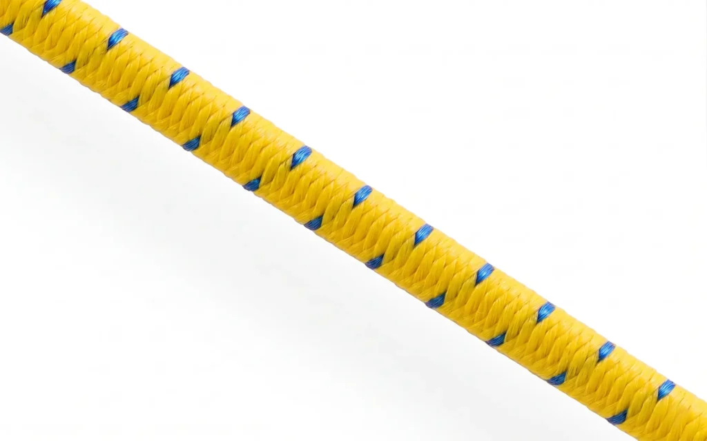 Yellow 16-plait polypropylene shock cord with blue tracers. Natural rubber multi-strand core enables 100% elongation for high tension industrial tie-downs.