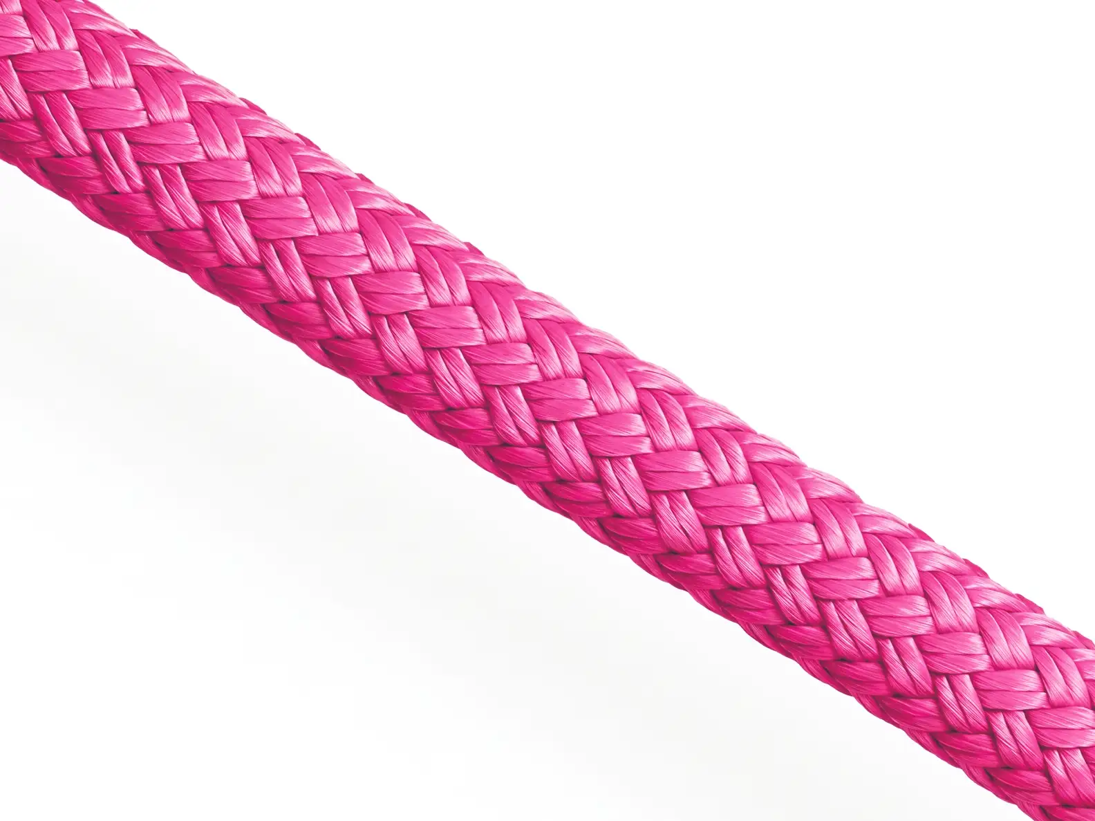 Detail of pink 24-strand Rig-Tex polyester rigging rope highlighting the dense torque-balanced braid.