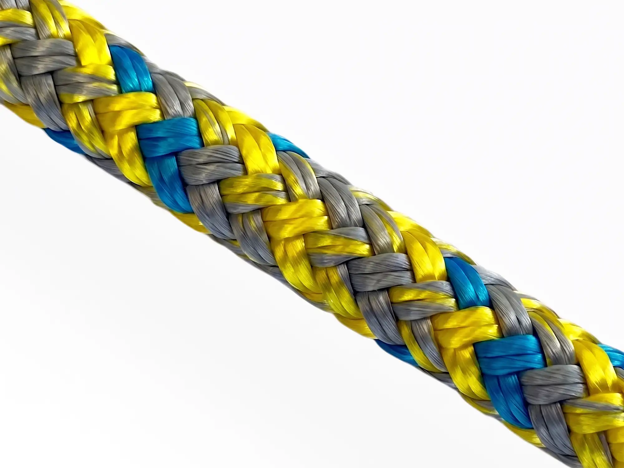 Macro view of Silva Prusik rope showing yellow, blue and grey polyester braid for arborist friction hitches.